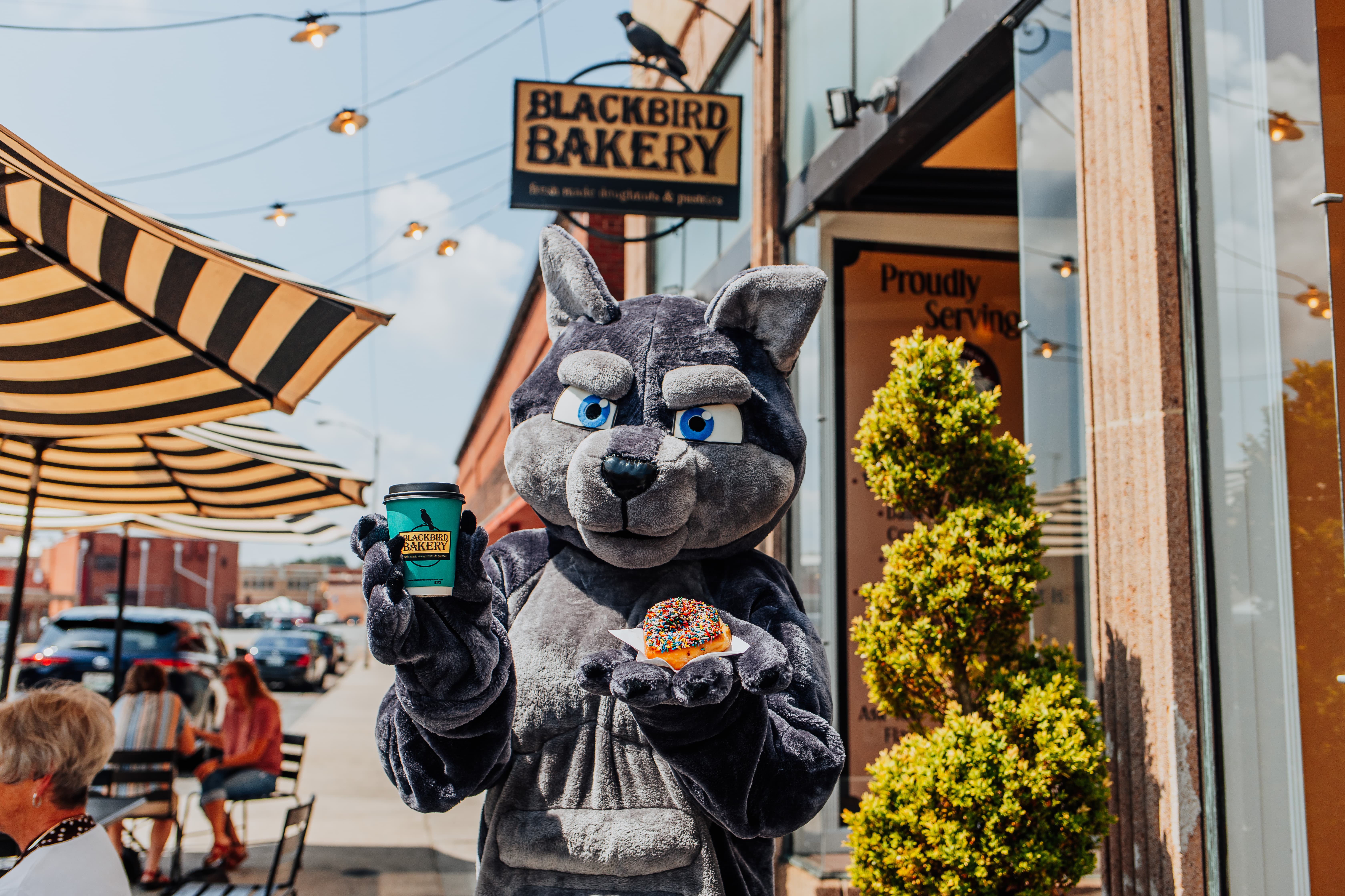 VHCC Wolf Mascot outside Blackbird Bakery
