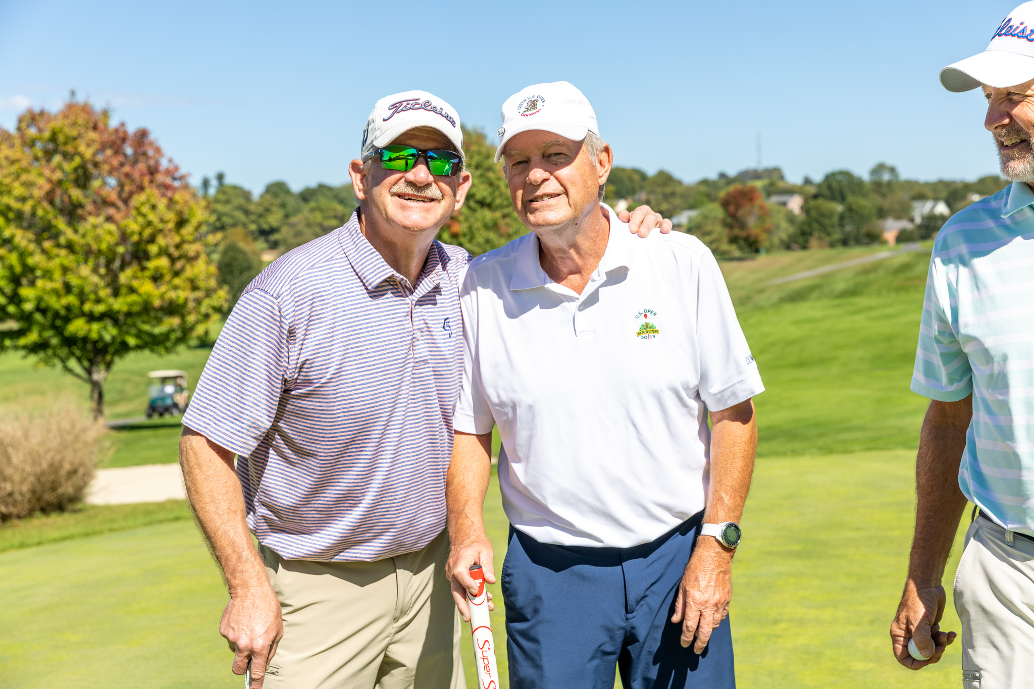 Two Golfers Smiling for the Camera