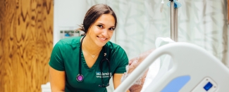 Woman in nurse scrubs