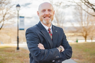 Dr. Adam Hutchison, President of VHCC