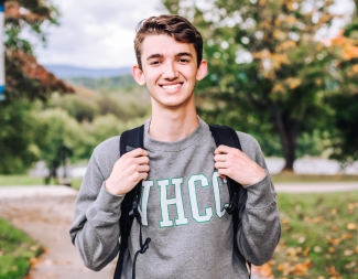 Male student wearing backpack